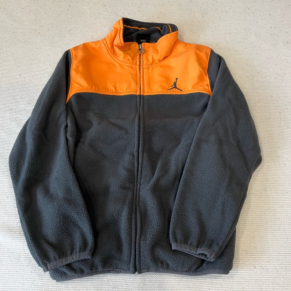 Pre owned, like new unisex zip up fleece sweater by “JORDAN”